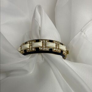 Kenneth Jay Lane Gold and Black Bracelet with Elegant Design